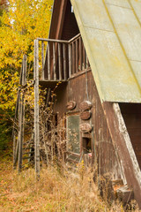 Old deserted hut near rusty ski lift in Polana mountains © Michal