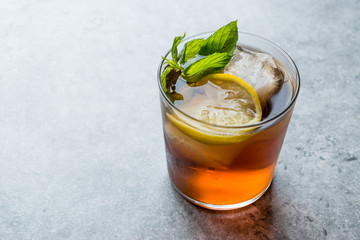 Cold Iced Tea Bergamot with Mint Leaves, Lemon and Ice.
