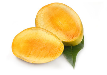 Mango fruit slice with green leaf isolated