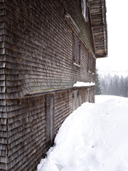 Striking outer wall of a drying frame covered with shingles