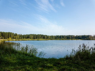 drone image. aerial view of rural area with fields and forest lake