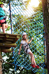 crossing the route in a rope park