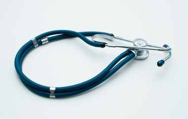 Stethoscope in blue Isolated on white. Detailed image of medical instrument.