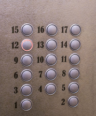 buttons with numbers in the Elevator to select the metal floor