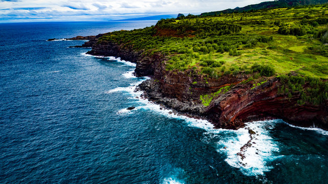 Kapalua coast Maui Hawaii drone photo &ndash; Coast of Kapalua at sunset in Maui Hawaii.  Beautiful high-resolution photo of the Hawaiian Islands and beautiful water.