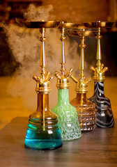Colorful hookah in steam © saeid yaghoubi