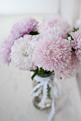 Bouquet of beautiful fresh flowers of pink color. It can be used as a background