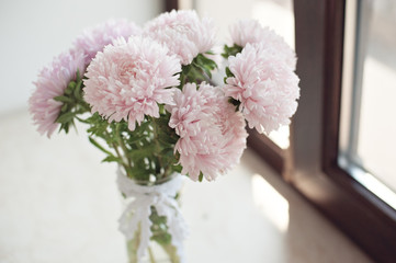 Bouquet of beautiful fresh flowers of pink color. It can be used as a background