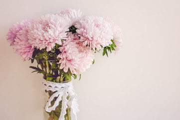 Bouquet of beautiful fresh flowers of pink color. It can be used as a background