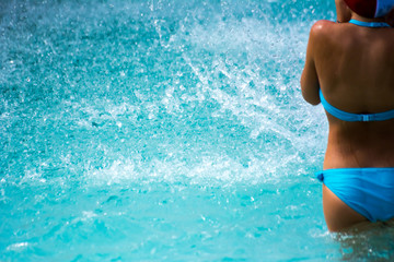 Close Up of a Child Diving in the Swimming Pool