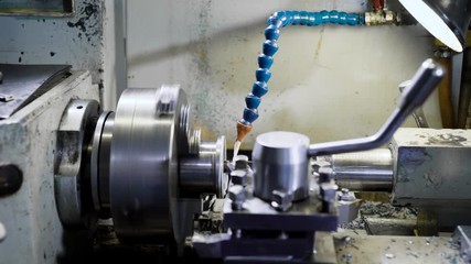 CNC lathe machine Turning machine cutting the metal screw thread part .Hi-precision CNC machining concept. - Powered by Adobe