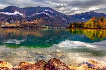 Wolfgangsee lake view, Sankt Gilgen, Austria. Picturesque landscape of Alpine lake and mountains
