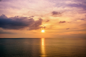 Naklejka na ściany i meble Beautiful natural landscape of orange sky sun and sea during sunset at the coast of Koh Samui island, Surat Thani, Thailand