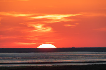 Red Sun Touches The Horizon