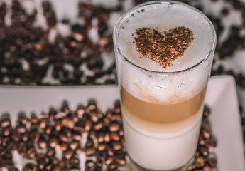 coffee with beans and cinnamon