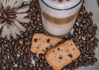 coffee with beans and cinnamon