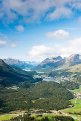 Fototapeta na wymiar View of the top of Piz da Staz and lakes in the area St.Moritz.
