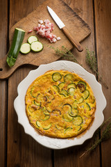 omelette with bacon and zucchinis