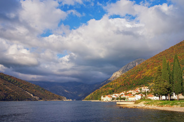 Fototapeta na wymiar Beautiful Mediterranean landscape on sunny autumn day. Montenegro, Bay of Kotor, Verige Strait, Lepetane village