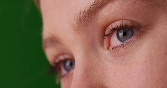 Close up view of Caucasian woman with blue eyes on green screen