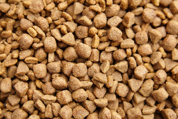 Dry food for dogs and cats. Pet meal as background