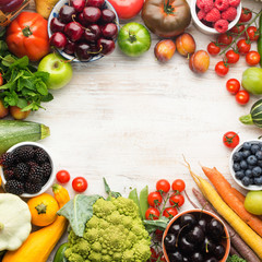 Healthy living, summer fruits vegetables berries arranged in a circle frame. Organic produce, raw...