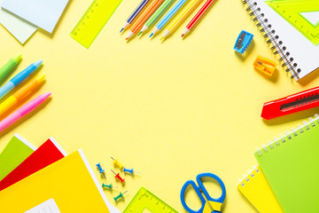 School and office sstationery on yellow background. 