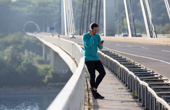 Man listening music after jogging