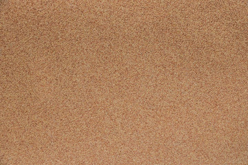 Sand Texture Background. Top View of a Beach or Desert Ground Surface. Closeup View of a Beige Natural Sand