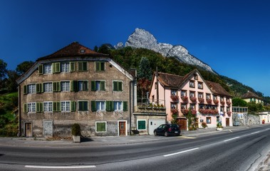 Fototapeta na wymiar Peak of the Gonzen seen from street level in Sargans, Swiss Rhine valley