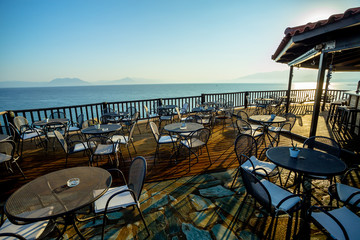 Early Summer Morning on the Wooden Terrace with View of the Sea