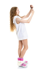 cute little girl making selfie