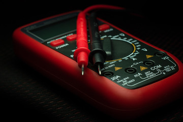 Digital multimeter on black background