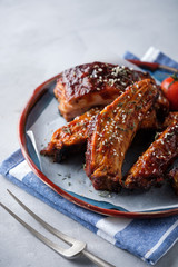 Smoked Roasted pork ribs on the plate. Delicious grilled bbq ribs
