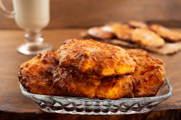 A delicious dessert from a round of biscuits are homemade and the milk poured into the cup.