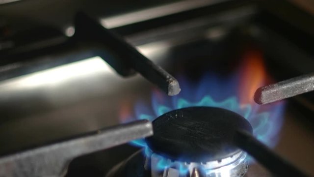 Closeup of working natural gas stove