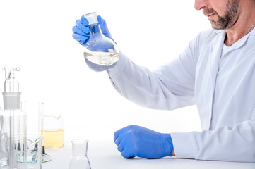 man in the laboratory / view of a man in the laboratory while performing experiments