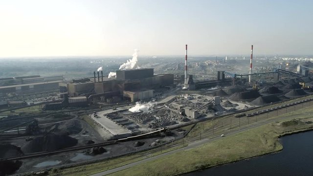 Time Lapse of an Industrial Processing and Production Facility With Pollution 
