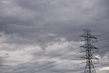 Electricity pylon or tower, power lines, cloudy sky, stormy, Texas