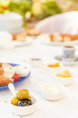 Coffee, Cheese, Honey, Jam,  Olives, Simit. Authentic turkish breakfast. Local cuisine concept
