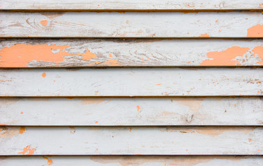 White and Orange Painted Wood Wall