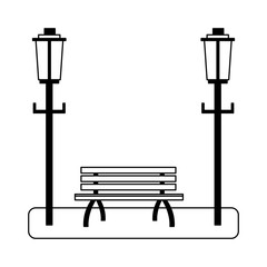 Park chair and street light in black and white