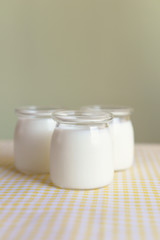 three jars of yogurt