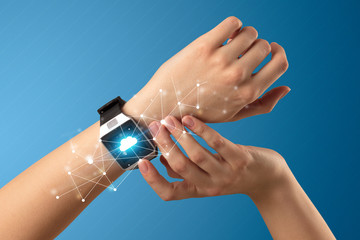 Naked female hand with smartwatch and with cloud technology and connection  symbol