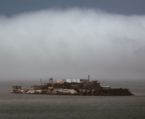 Fototapeta na wymiar Alcatraz Island In The Mist Off Of San Francisco