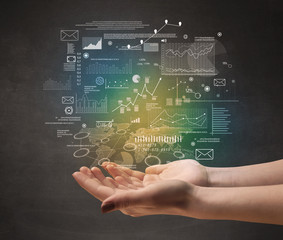 Demographic related charts, diagrams and graphs hovering over young hand