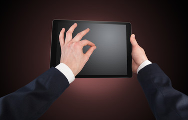 Hand using tablet with no concept and empty space
