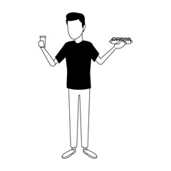Man with hotdog and soda cup in black and white