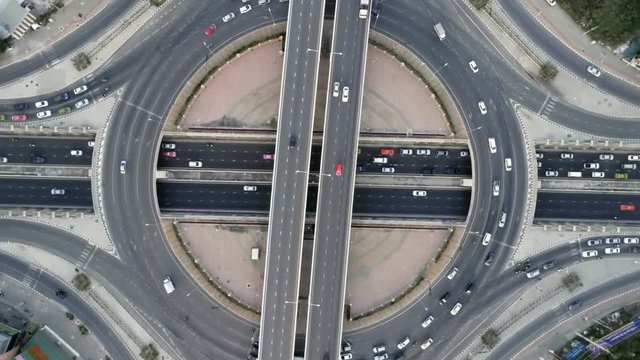 aerial top view traffic on circle road in city at day,  Rotational view, Traffic in Bangkok thailand.