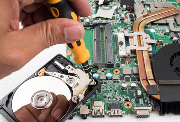 Obraz premium Technician support upgrade part and fixing laptop.